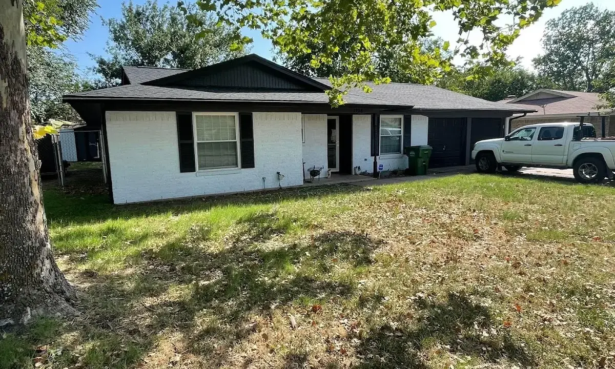 Professional roofing crew working on a residential roof in Paloma Creek South